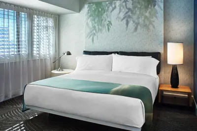 a bedroom with a large bed and a window at W Los Angeles – West Beverly Hills in Los Angeles