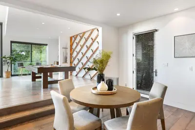 a dining room with a table and chairs at Franklin Modern in Los Angeles