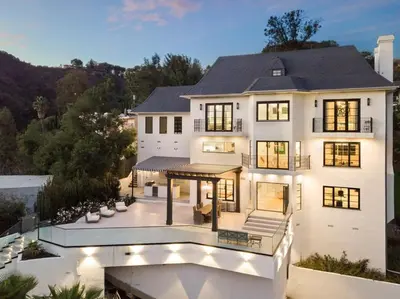 an aerial view of a large white house at Beverly Hills Maison in Beverly Hills