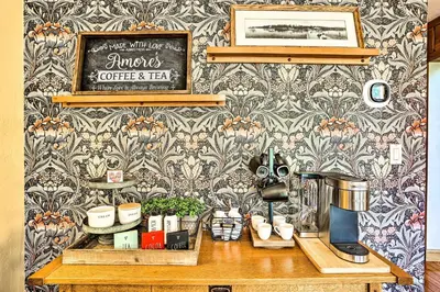a table with a coffee maker on a wall at Tranquil Twin Peaks Retreat Hike, Ski and Swim in Twin Peaks