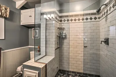 a bathroom with a glass shower with a toilet at Tranquil Twin Peaks Retreat Hike, Ski and Swim in Twin Peaks