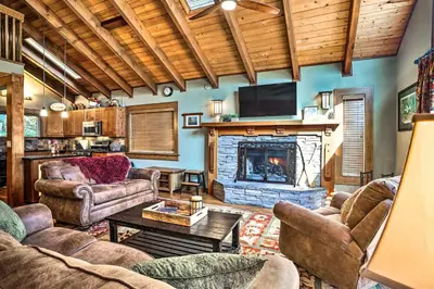 a living room with couches and a fireplace at Tranquil Twin Peaks Retreat Hike, Ski and Swim in Twin Peaks
