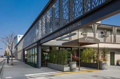 a store front of a building on a street at Olivia Hotel in Los Angeles