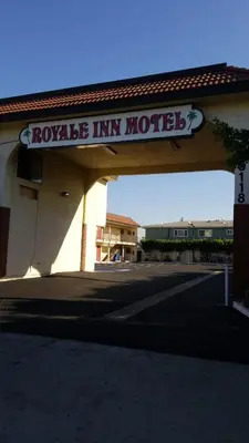 a motel sign on the side of a building at Royale Inn Motel in Whittier