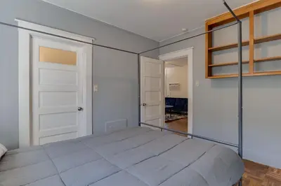 a bedroom with a bed and a closet at Los Angeles 3 Bedroom Charmer Large Guest House in Los Angeles