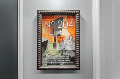 a picture in a frame hanging on a wall at Hollywood Le Bon Hotel in Los Angeles