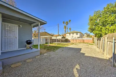 a stroller is parked outside of a house at Riverside House with Yard about 1 Mi to Downtown! in Riverside