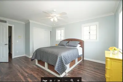 a bedroom with a bed and a ceiling fan at Valencia CA Stunning 3100 +sqft, 5Bed/5Bath home in Santa Clarita