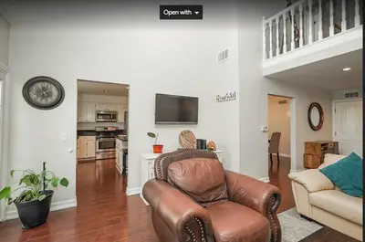 a living room with a couch and a chair at Valencia CA Stunning 3100 +sqft, 5Bed/5Bath home in Santa Clarita