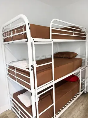 a bunk bed room with two bunk beds at Fruit Hostel in Los Angeles