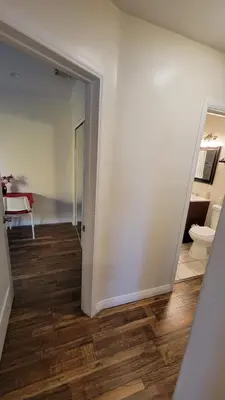an open hallway with a toilet in a room at Adorable modern guesthouse with full kitchen in Encino