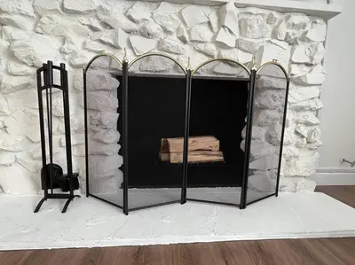a fireplace with a fire place in a room at Beautiful and Cozy 4-BR residential home!!! in Oxnard