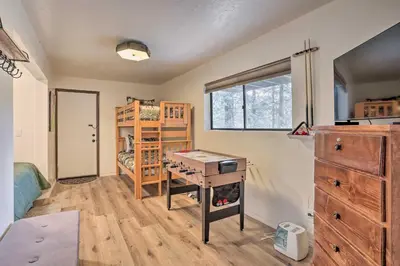 a room with a desk and a bed in it at Woodsy Twin Peaks Getaway with Hot Tub and Views! in Twin Peaks