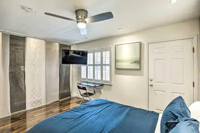 a bedroom with a bed and a ceiling fan at 2 Mi to Griffith Park! Burbank Extended-Stay Condo in Burbank