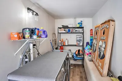 a room with a kitchen with a counter top at Stunning Lake Arrowhead Cabin with Lake Views! in Lake Arrowhead