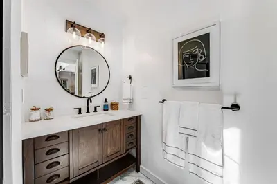 a bathroom with a sink and a mirror at Paradise in the Palisades in Lake Arrowhead