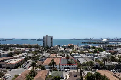 an aerial view of a city with the ocean at Spacious Coastal Apartment in a Colorful Community - NRP22-00590 in Long Beach