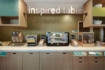 a prepared table in a fast food restaurant at Home2 Suites By Hilton Garden Grove in Garden Grove