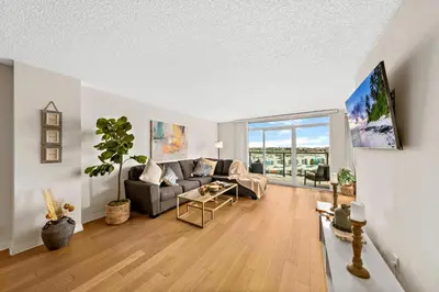 a living room with a couch and a table at The tulip Marina Highrise with ocean view in Los Angeles