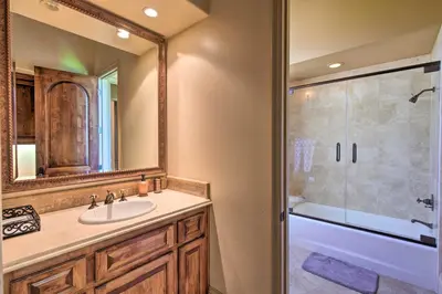 a bathroom with a sink and a shower at Stunning Palmdale Villa Oasis on Vineyard! in Palmdale