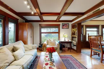 a living room with a couch and a table at Highland Park Haven in Los Angeles