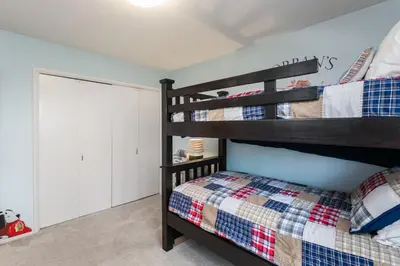 a bedroom with a bunk bed and a bunk bed at Sunset Palace in Hermosa Beach