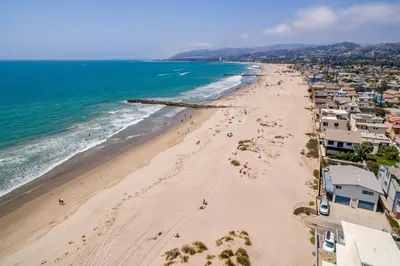 an aerial view of a beach with people on it at Brockton Diamond in Ventura