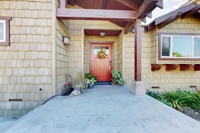 a front door of a house with a red door at Brockton Diamond in Ventura