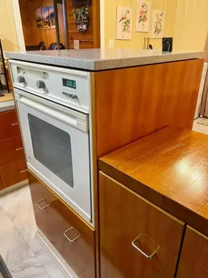 a kitchen with a white oven and a counter at Snow Bunny Cottage, Pets Welcomed! in Green Valley Lake
