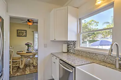 a kitchen with a sink and a window at Carpinteria Apt with Hot Tub - 10 Min Walk to Beach! in Carpinteria
