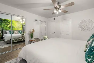 a bedroom with a bed and a ceiling fan at The Avalon - 35 Percent Off March! in Los Angeles