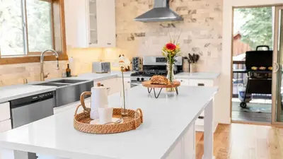 a kitchen with a counter with baskets on it at Teddy by AvantStay Majestic Cabin in Big Bear w Balcony in Big Bear Lake