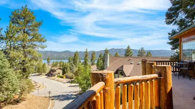 a view from the deck of a house with a view at Zen Den by AvantStay Entertainers Home in Ideal Big Bear Location w Hot Tub in Big Bear Lake