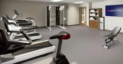 a gym with a row of chairs and a treadmill at Candlewood Suites - Loma Linda - San Bernardino S by IHG in Loma Linda