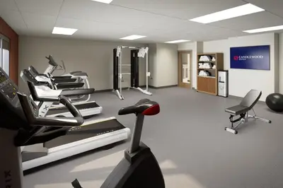 a gym with several cardio machines in a room at Candlewood Suites - Loma Linda - San Bernardino S by IHG in Loma Linda