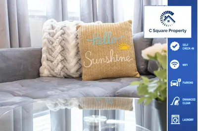 a pillow that says hello sunshine sitting on a chair at Bright & Cozy Getaway-10min to Downtown LA in Alhambra
