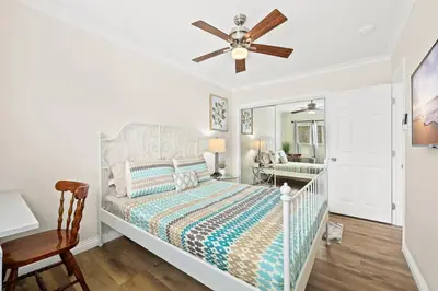a bedroom with a bed and a ceiling fan at Bright & Cozy Getaway-10min to Downtown LA in Alhambra