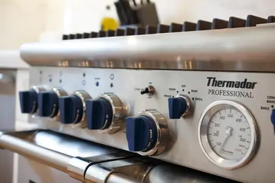 a close up of a stove with a thermometer on it at Beautiful 2 Story Right by the Water, Ocean View in Long Beach
