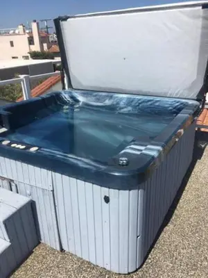 a hot tub sitting on top of a boat at Beautiful 2 Story Right by the Water, Ocean View in Long Beach