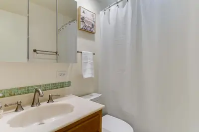 a bathroom with a sink and a toilet at 4 Bedroom West Hills Charmer with Pool and Jacuzzi in Los Angeles
