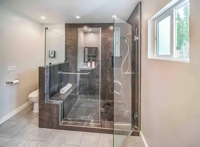 a bathroom with a glass shower with a toilet at Luxury house pool & Spa 10 mins from Hollywood & Universal Studios in Los Angeles