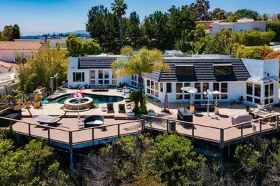 an aerial view of a house with a swimming pool at Beverly Hills City View Mansion in Los Angeles