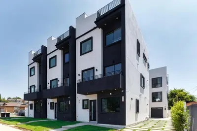 an apartment building with a black and white facade at Luxury Modern 4 Bedroom 3 Bathroom Home with Rooftop Deck #2 in Los Angeles