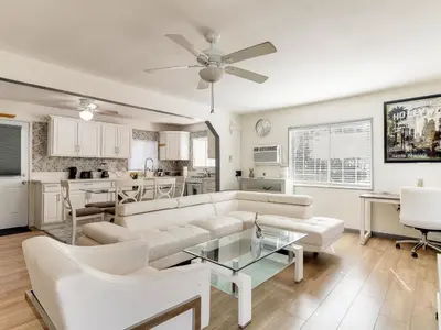 a living room with a couch and a table at 3 bedroom Mid-Wilshire Charmer near Downtown in Los Angeles