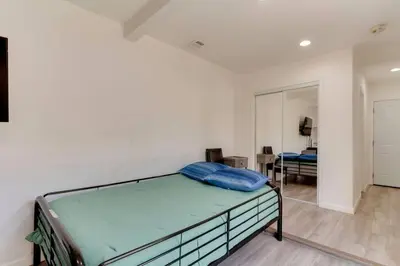 a bedroom with a bed in a room at Large 5 bedroom charmer wIth pool in Los Angeles
