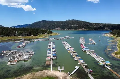 an aerial view of a marina with boats in the water at Walk to Big Bear Lake Cozy Cabin with Deck in Big Bear Lake