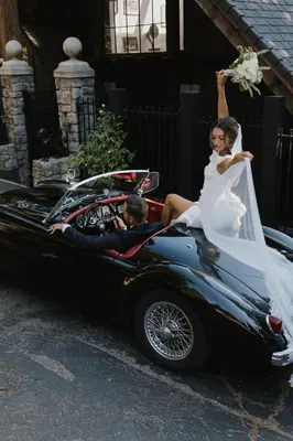 a bride and groom in a convertible car at 100 Mile View-Fire Pit, Romantic, Peaceful, Private in Crestline