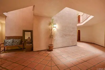 a large room with a potted plant in the middle at The Best Santa Monica Beach Area, Any days,Newly Remodeled in Los Angeles