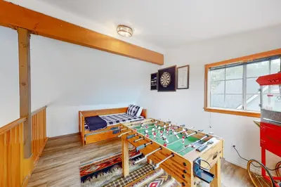 a room with a ping pong table in it at Sequoia Serenity in Lake Arrowhead