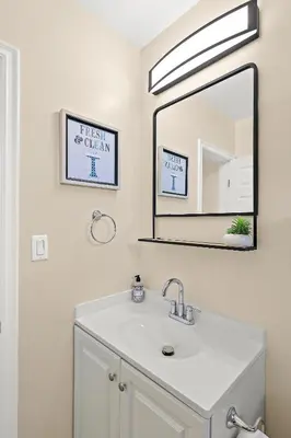 a bathroom with a sink and a mirror at Sunny & Cheerful Near I-10 Queen Beds w Parking! in Alhambra